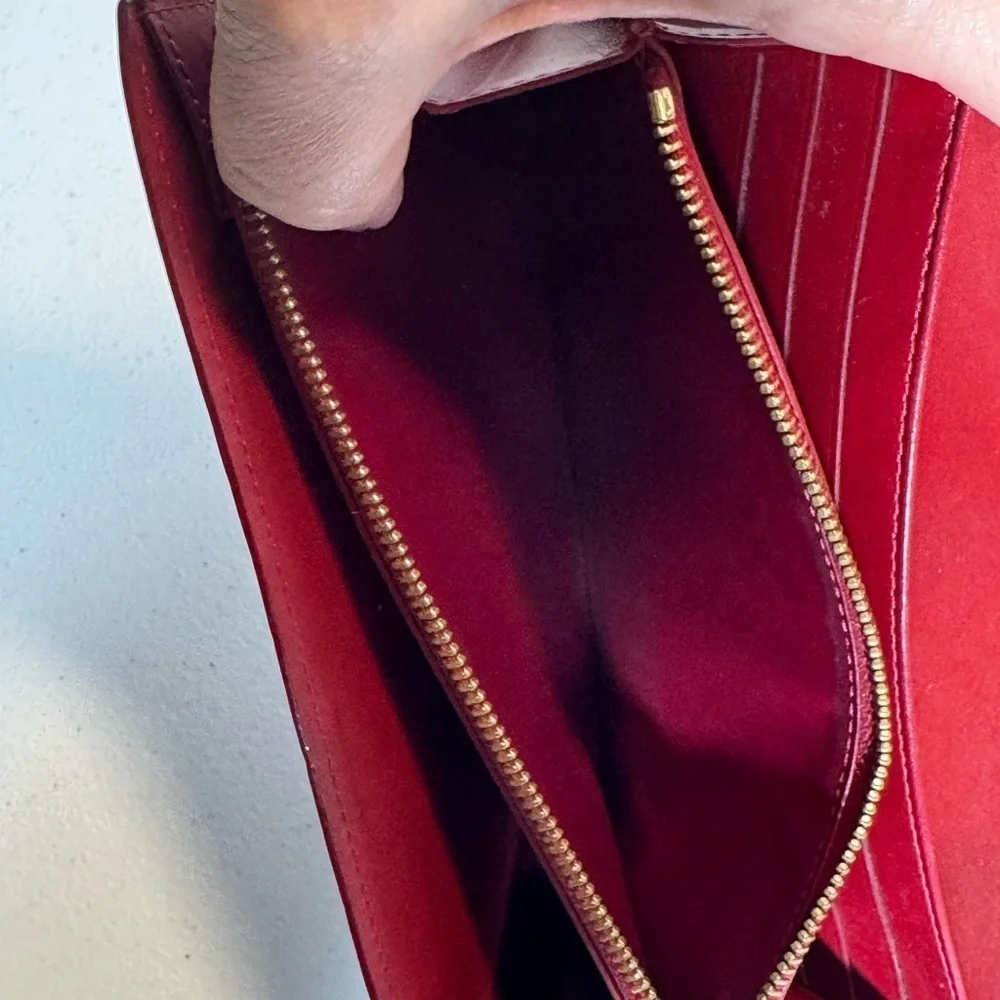 AUTHENTIC Louis Vuitton Red Wallet with Monogram Embossing